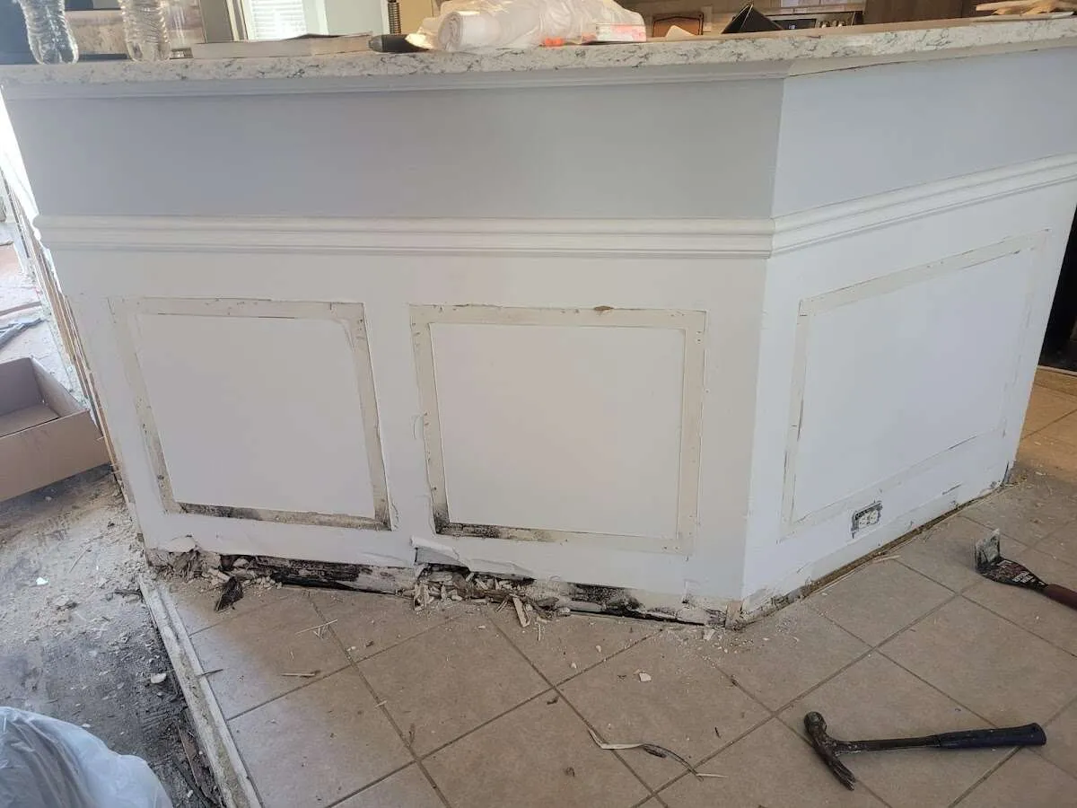 Water damage and mold on kitchen during Storm Damage Restoration in Highland Park